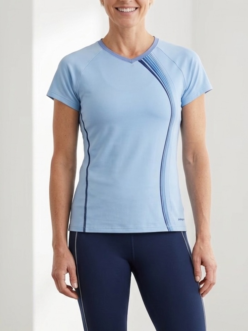 Patagonia Light Blue Athletic Top with Navy Stripe Accents size L